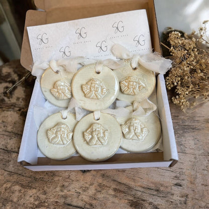 Medallitas de cerámica